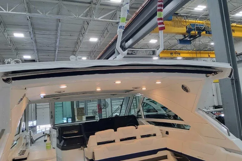 Slide: The Image of Luxurious interior of 2026 Formula 400 Super Sport Crossover yacht with sleek seating and kitchenette. - 12