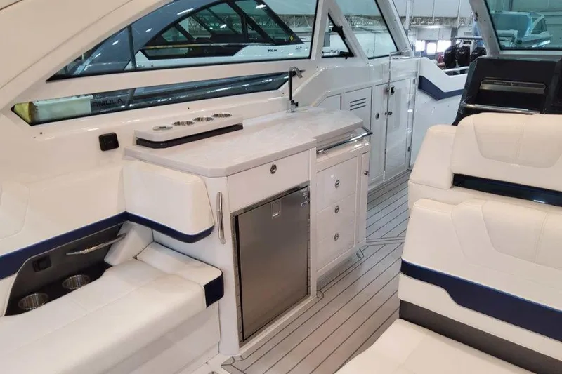 Slide: The Image of 2026 Formula 400 Super Sport Crossover helm with advanced navigation displays and controls. - 20