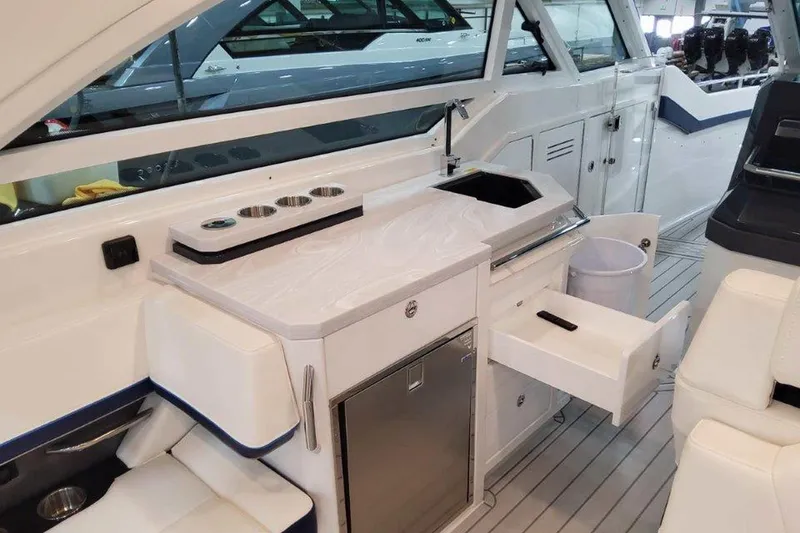 Slide: The Image of 2026 Formula 400 Super Sport Crossover dashboard with advanced controls and dual screens. - 21