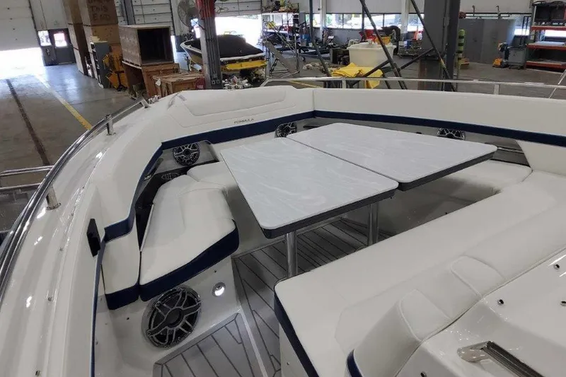 Slide: The Image of Boxes of 1st Mate wearable FOB kits inside a storage compartment on a Formula 400 Super Sport Crossover. - 37