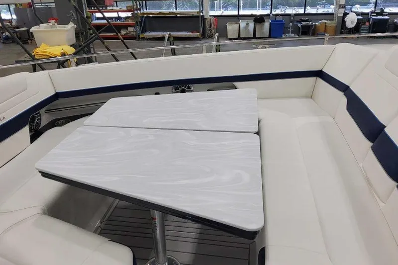 Slide: The Image of Interior of 2026 Formula 400 Super Sport Crossover with modern kitchenette and sleek design. - 38