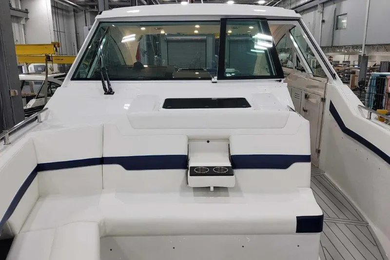 Slide: The Image of Cabinet interior of 2026 Formula 400 Super Sport Crossover with trash bin and storage. - 39