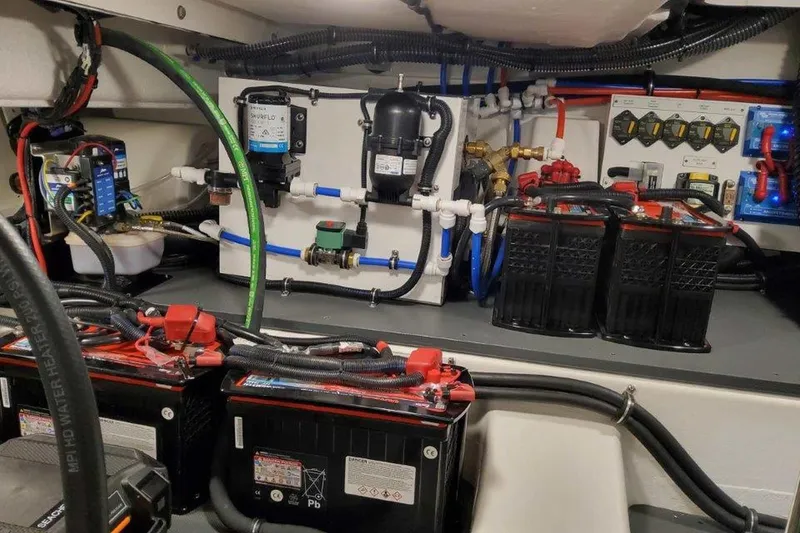 Slide: The Image of Engine room of 2026 Formula 400 Super Sport Crossover with fuel filters and fire extinguisher. - 52