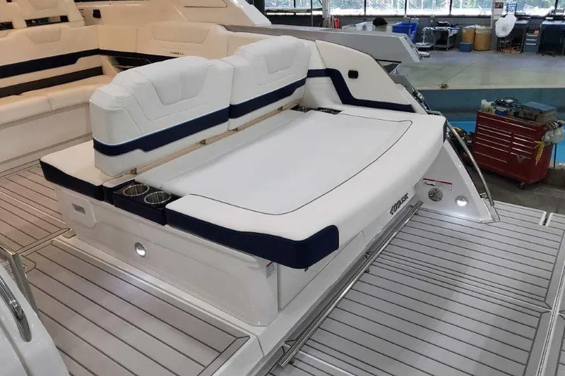 Slide: The Image of Control panel of 2026 Formula 400 Super Sport Crossover boat with switches and storage. - 8