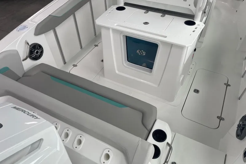 Slide: The Image of 2026 Hurricane Center Console 24 OB boat interior with seating and storage features. - 10
