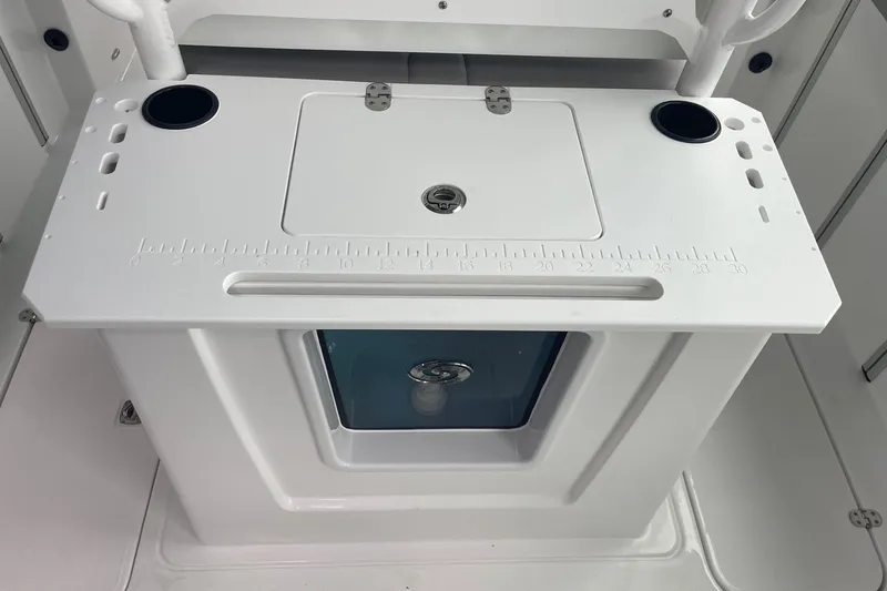 Slide: The Image of 2026 Hurricane Center Console 24 OB boat with integrated storage and cup holders. - 12