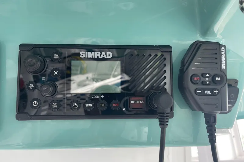 Slide: The Image of Simrad marine radio system on 2026 Hurricane Center Console 24 OB boat. - 30