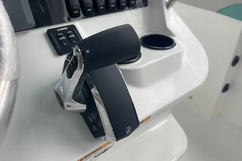Slide: The Image of Throttle control on 2026 Hurricane Center Console 24 OB boat dashboard. - 50