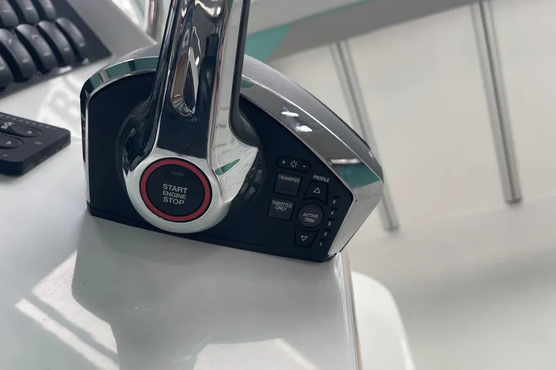 Slide: The Image of Throttle control panel of 2026 Hurricane Center Console 24 OB boat. - 51