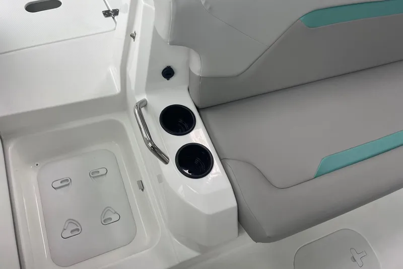 Slide: The Image of 2026 Hurricane Center Console 24 OB boat interior with cup holders and seating. - 55