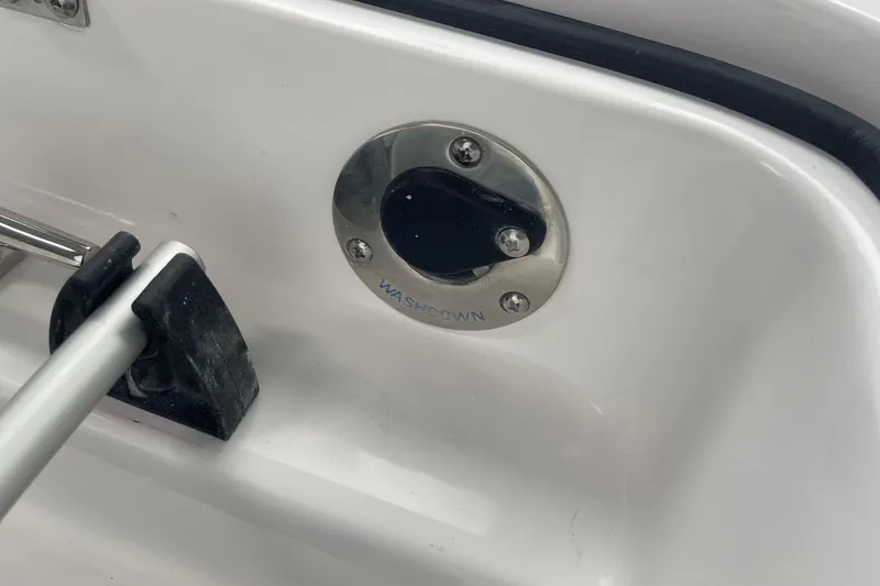 Slide: The Image of 2026 Hurricane Center Console 24 OB boat washdown fitting detail. - 59