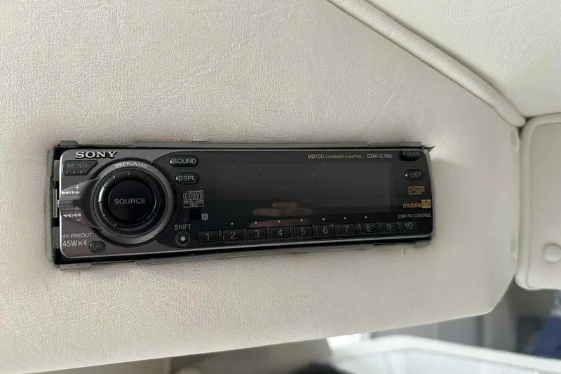 Slide: The Image of Sony CDX-C780 stereo system in a 1997 Fountain 29 Fever boat interior. - 16