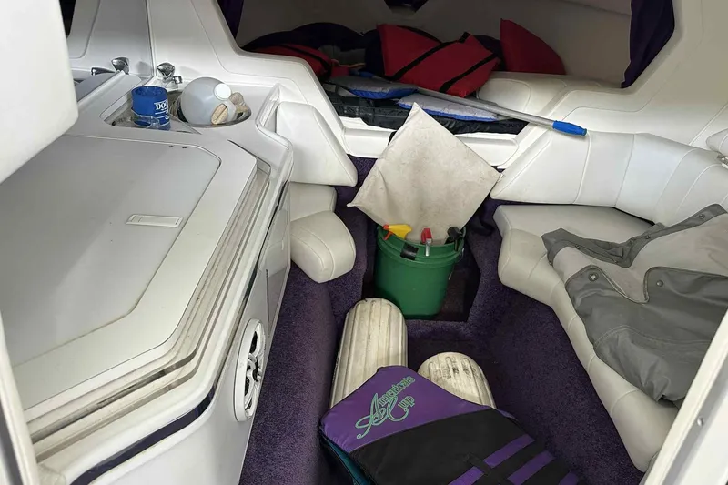 Slide: The Image of Interior of a 1997 Fountain 29 Fever boat with seating and storage items. - 7