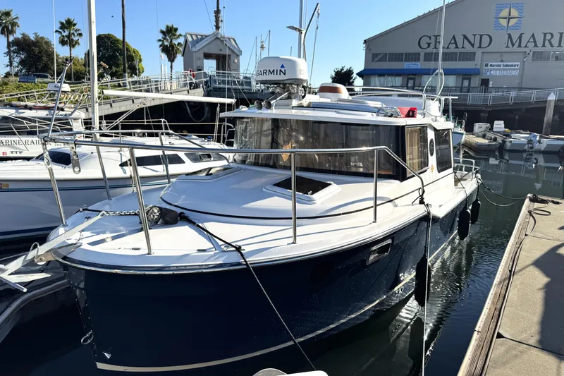 The Image of 2019 Ranger Tugs R-23 boat docked at marina, featuring sleek design and modern equipment. - 0