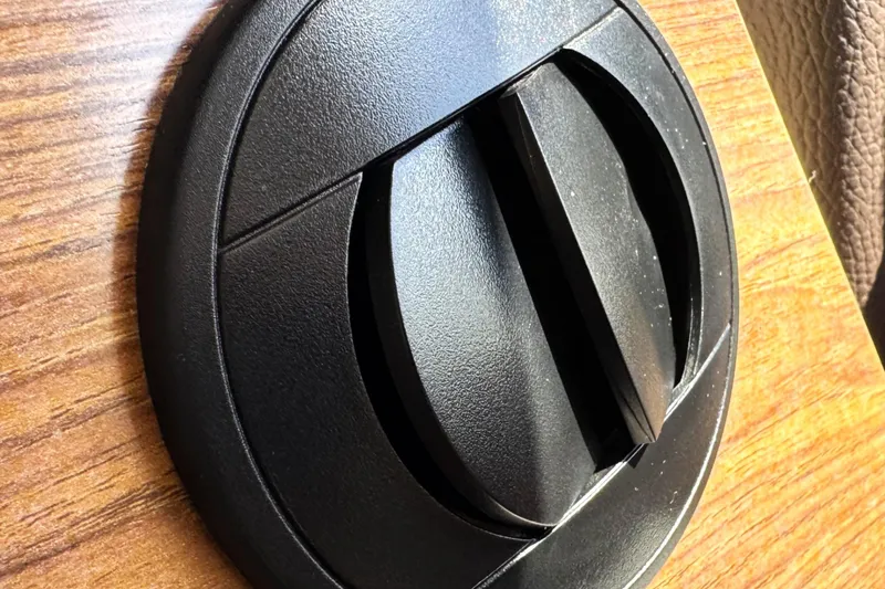 Slide: The Image of Black circular vent on 2019 Ranger Tugs R-23 boat interior. - 12