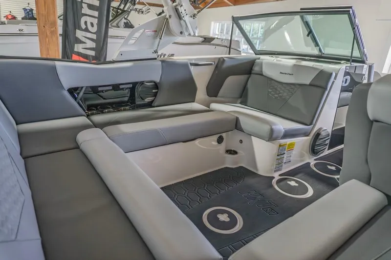 Slide: The Image of Interior of 2026 MasterCraft NXT20 boat with sleek gray seating and modern design. - 6