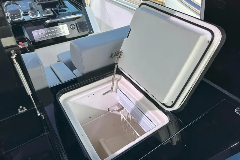 Slide: The Image of Open storage compartment on 2016 Fjord 48 Open yacht, featuring sleek interior design. - 14
