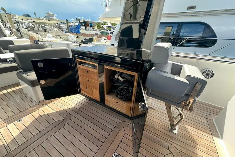 Slide: The Image of Luxurious 2016 Fjord 48 Open yacht interior with sleek seating and storage. - 15