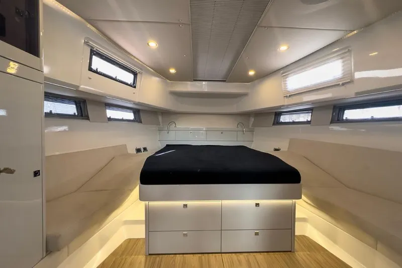 Slide: The Image of Luxurious interior of 2016 Fjord 48 Open yacht with modern design and ambient lighting. - 16