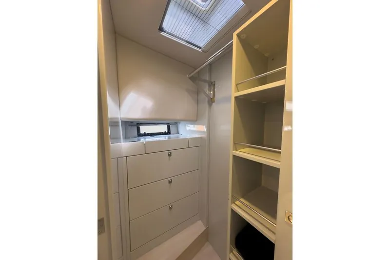 Slide: The Image of Interior storage area of 2016 Fjord 48 Open yacht with drawers and shelves. - 19