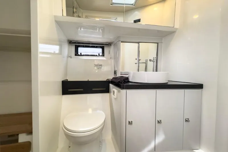 Slide: The Image of Modern bathroom interior of 2016 Fjord 48 Open yacht, featuring sleek design and fixtures. - 24