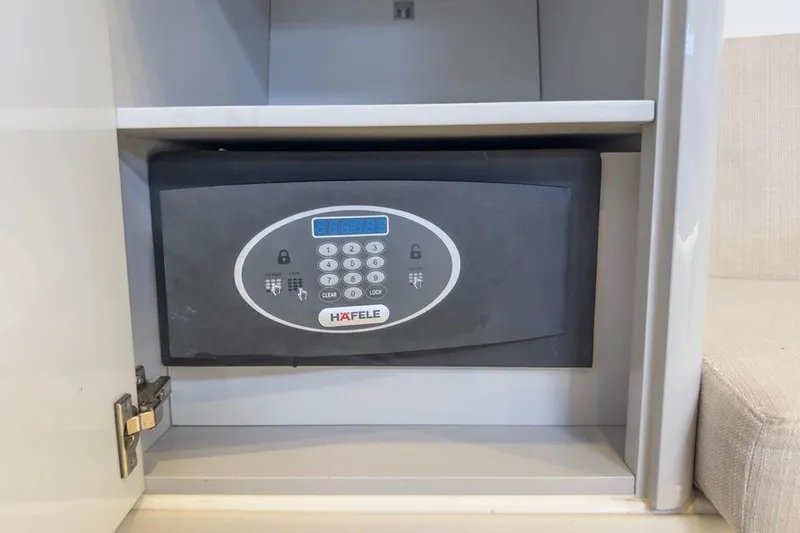 Slide: The Image of Secure safe inside a cabinet on a 2016 Fjord 48 Open yacht. - 27