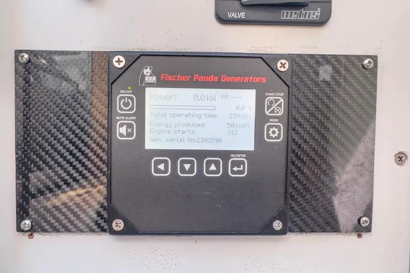 Slide: The Image of Fischer Panda generator display on 2016 Fjord 48 Open, showing power and operating stats. - 30