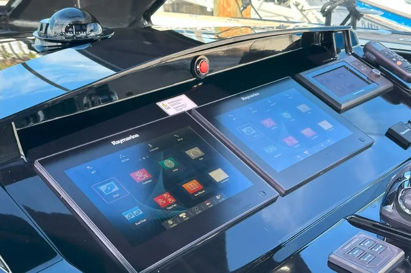 Slide: The Image of Control panel of 2016 Fjord 48 Open yacht with Raymarine touchscreens. - 45