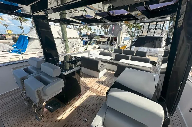 Slide: The Image of Luxurious 2016 Fjord 48 Open yacht interior with modern seating and sleek design. - 50