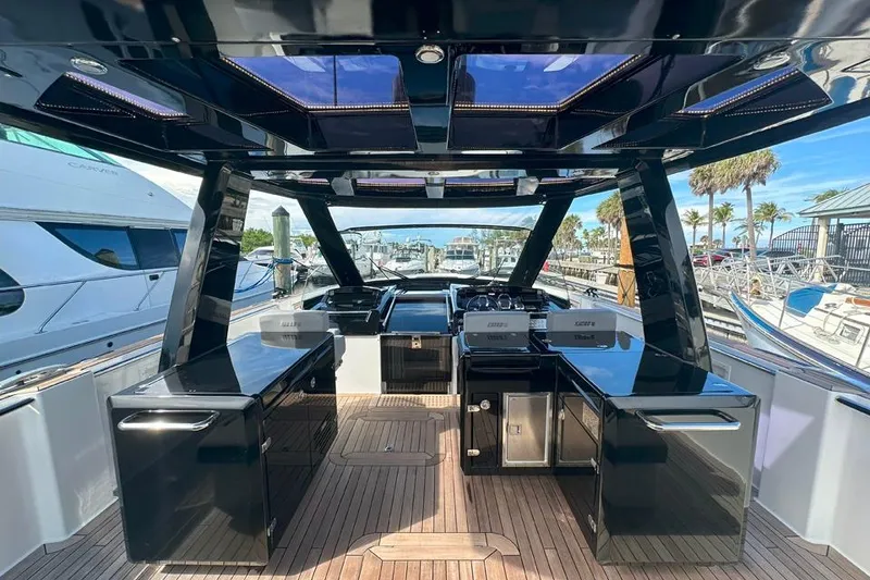 Slide: The Image of Luxurious 2016 Fjord 48 Open yacht interior with sleek black design and modern amenities. - 52