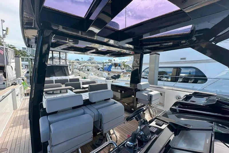 Slide: The Image of Luxurious 2016 Fjord 48 Open yacht interior with modern seating and sleek design. - 54
