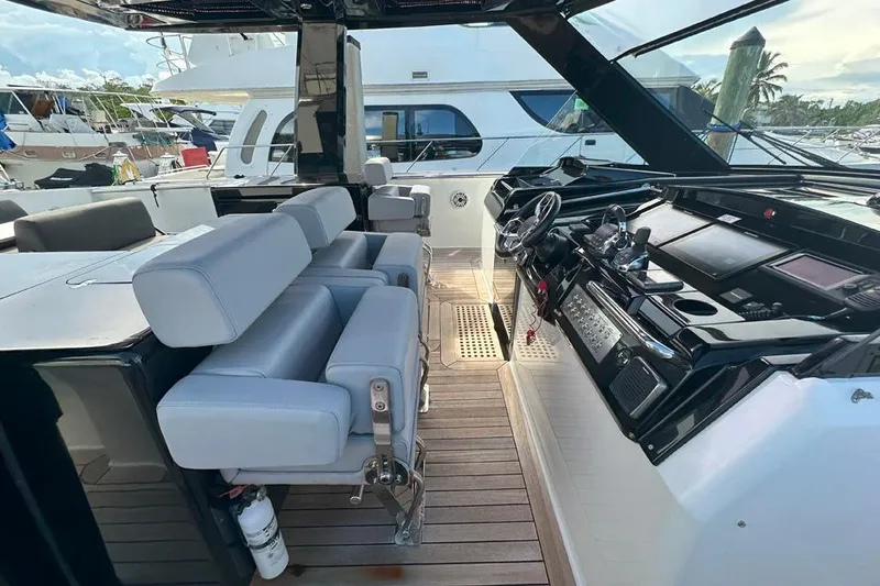 Slide: The Image of Luxurious 2016 Fjord 48 Open yacht interior with modern helm and seating. - 55