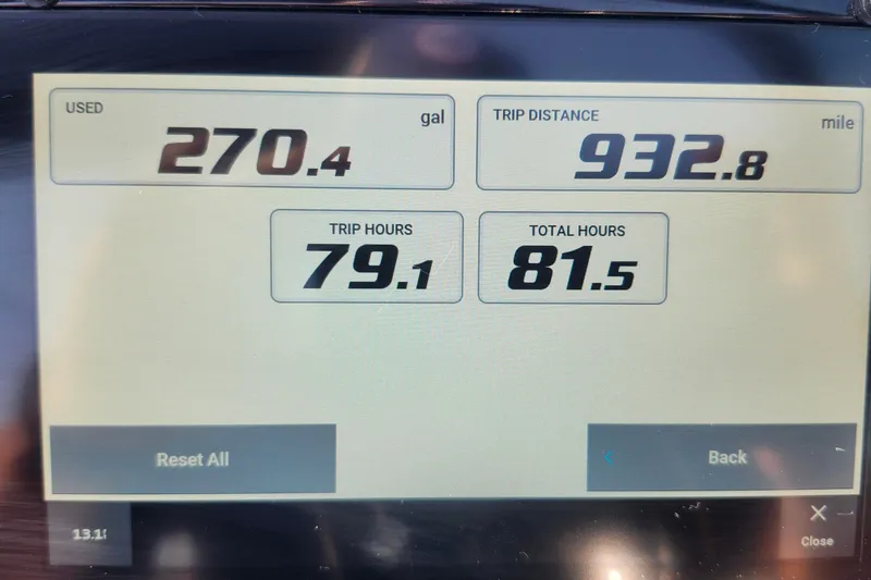 Slide: The Image of Display screen showing fuel usage, trip distance, and hours for 2023 Regal 21 OBX boat. - 4