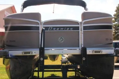 Slide: The Image of 2012 Premier 221 Gemini pontoon boat on trailer, rear view. - 2