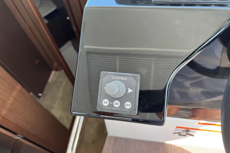 Slide: The Image of Control panel of 2024 Beneteau Antares 11 with Sleipner thruster switch. - 11