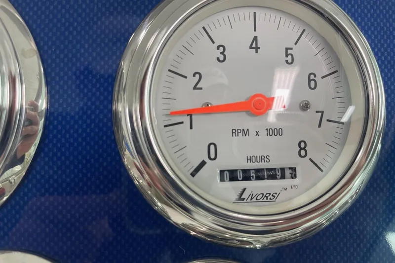 Slide: The Image of Tachometer of 2005 Formula 292 FASTech showing RPM and hours, Livorsi brand. - 11