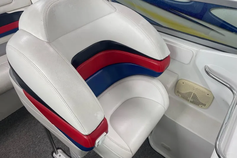 Slide: The Image of 2005 Formula 292 FASTech boat interior with white, red, and blue seating. - 17