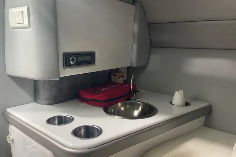 Slide: The Image of 2005 Formula 292 FASTech cabin interior with sink, storage, and modern amenities. - 23