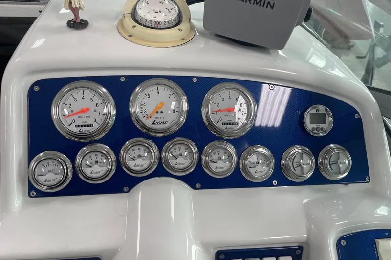Slide: The Image of Dashboard of a 2005 Formula 292 FASTech boat with Livorsi gauges and Garmin device. - 9
