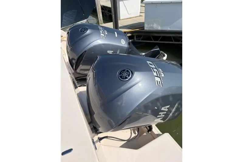 Slide: The Image of Twin Yamaha 350 outboard engines on a 2013 Grady-White Canyon 336 boat. - 29