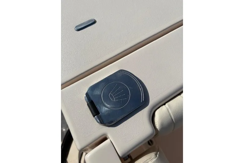 Slide: The Image of 2013 Grady-White Canyon 336 boat detail with latch and textured surface. - 31