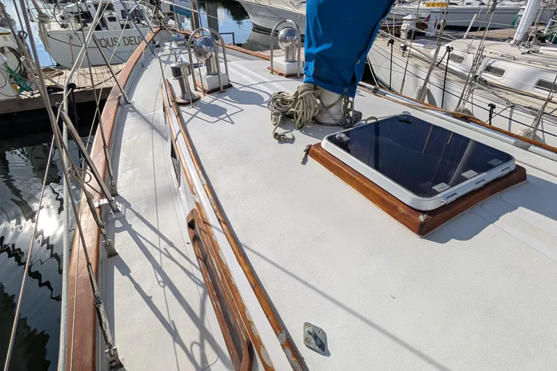 Slide: The Image of Deck of a 1983 Robert Perry 41 sailboat with winches and hatch. - 39