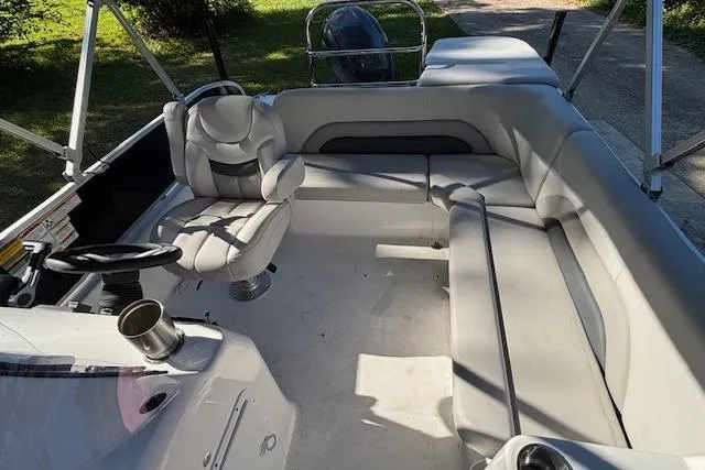 Slide: The Image of 2025 Hurricane FunDeck 198 RE OB boat interior with seating and steering console. - 6