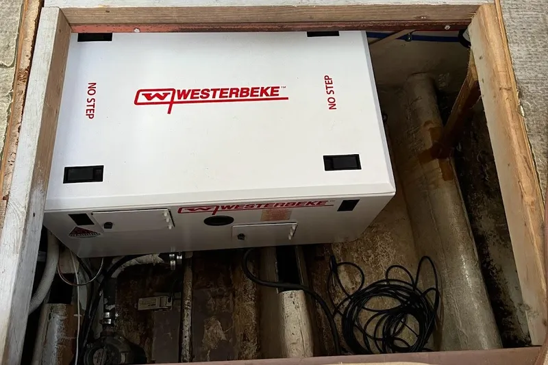 Slide: The Image of Westerbeke generator installed in 1963 Hatteras 34 Convertible boat engine compartment. - 39
