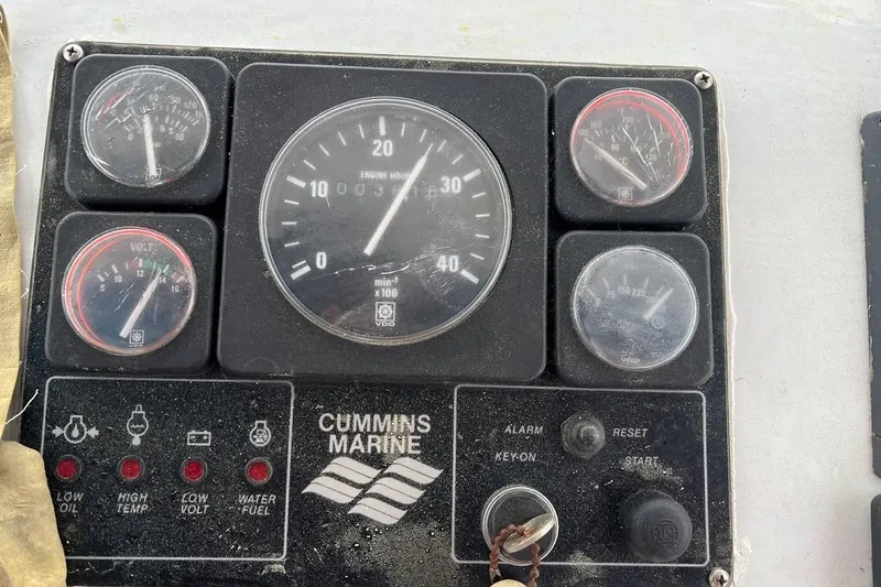 Slide: The Image of Control panel of a 1963 Hatteras 34 Convertible with Cummins Marine gauges. - 20