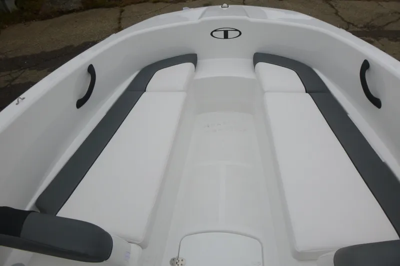 Slide: The Image of 2026 Tahoe T16 boat interior with white and gray seating, featuring sleek design and comfortable layout. - 10