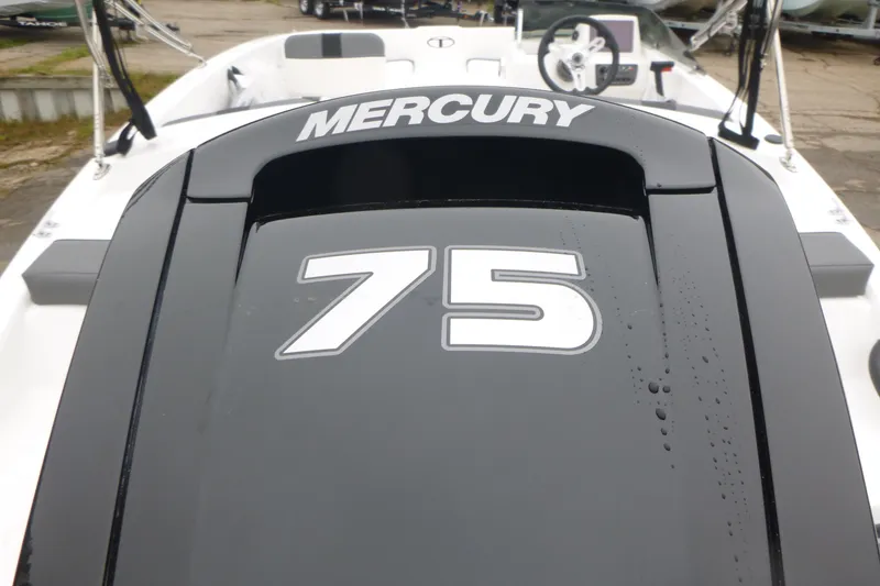Slide: The Image of 2026 Tahoe T16 boat with Mercury 75 engine, featuring sleek design and modern controls. - 14