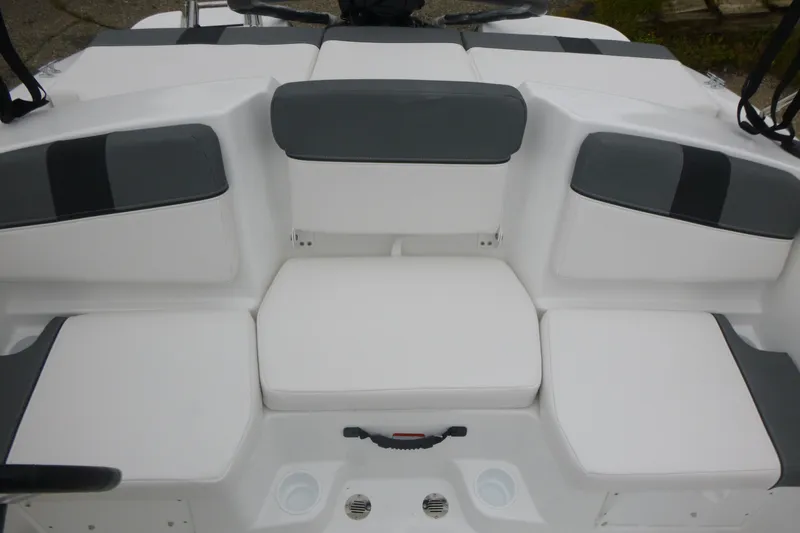 Slide: The Image of 2026 Tahoe T16 boat interior with white and gray cushioned seating. - 6