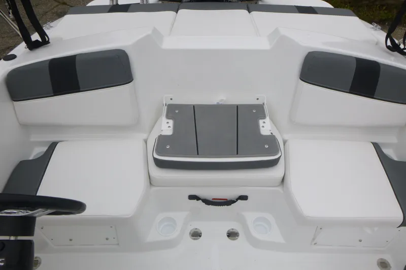 Slide: The Image of 2026 Tahoe T16 boat interior with gray and white seating arrangement. - 7