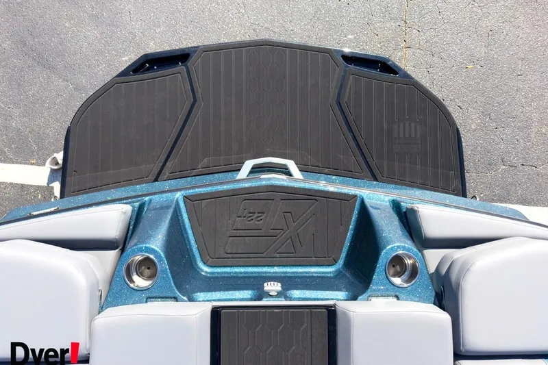 Slide: The Image of 2026 MasterCraft XT22 T boat deck with sleek design and comfortable seating. - 5